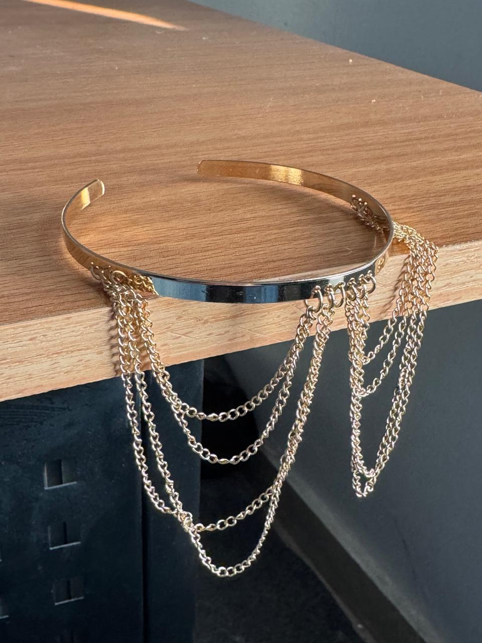 Gold bracelet arm