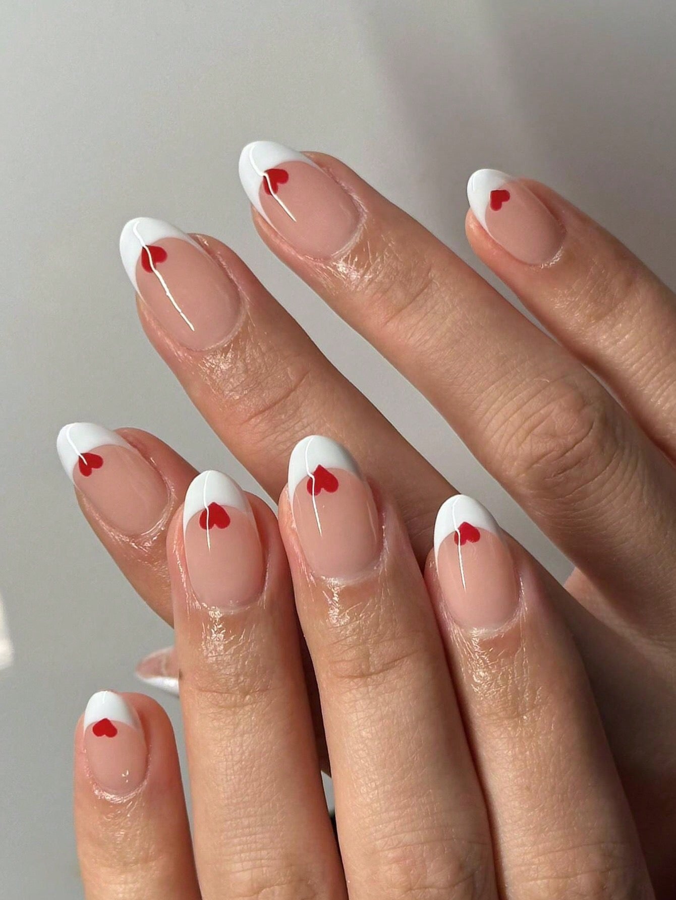 Short oval heart nail design white french